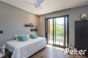 Casa em Condomínio à venda com 300m², 3 dormitórios, 3 suítes, 4 vagas, no bairro Alphaville em PORTO ALEGRE