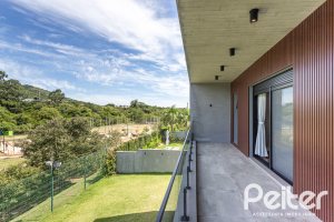 Casa em Condomínio à venda com 300m², 3 dormitórios, 3 suítes, 4 vagas, no bairro Alphaville em PORTO ALEGRE