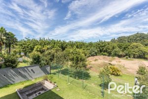 Casa em Condomínio à venda com 300m², 3 dormitórios, 3 suítes, 4 vagas, no bairro Alphaville em PORTO ALEGRE