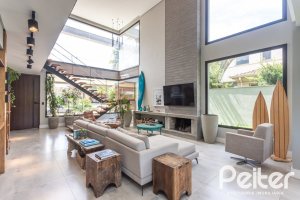 Casa em Condomínio à venda com 300m², 3 dormitórios, 3 suítes, 4 vagas, no bairro Alphaville em PORTO ALEGRE