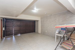 Casa em Condomínio à venda com 385m², 3 dormitórios, 1 suíte, 2 vagas, no bairro Cristal em Porto Alegre