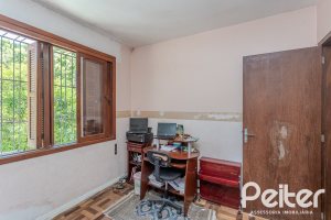 Casa à venda com 175m², 3 dormitórios, 1 suíte, 4 vagas, no bairro Vila Conceição em Porto Alegre