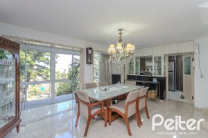 Casa em Condomínio à venda com 201m², 3 dormitórios, 1 suíte, 2 vagas, no bairro Tristeza em PORTO ALEGRE