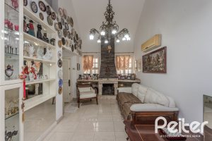 Casa em Condomínio à venda com 201m², 3 dormitórios, 1 suíte, 2 vagas, no bairro Tristeza em PORTO ALEGRE