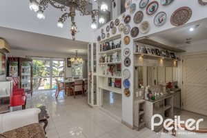 Casa em Condomínio à venda com 201m², 3 dormitórios, 1 suíte, 2 vagas, no bairro Tristeza em PORTO ALEGRE