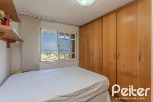 Casa em Condomínio à venda com 201m², 3 dormitórios, 1 suíte, 2 vagas, no bairro Tristeza em PORTO ALEGRE