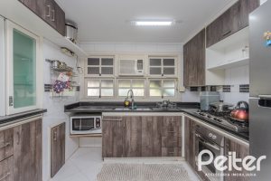 Casa em Condomínio à venda com 201m², 3 dormitórios, 1 suíte, 2 vagas, no bairro Tristeza em PORTO ALEGRE