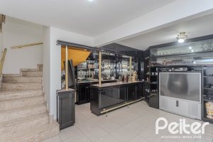 Casa em Condomínio à venda com 201m², 3 dormitórios, 1 suíte, 2 vagas, no bairro Tristeza em PORTO ALEGRE