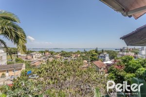 Casa em Condomínio à venda com 201m², 3 dormitórios, 1 suíte, 2 vagas, no bairro Tristeza em PORTO ALEGRE