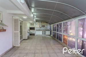 Casa em Condomínio à venda com 201m², 3 dormitórios, 1 suíte, 2 vagas, no bairro Tristeza em PORTO ALEGRE
