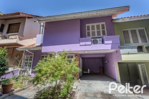 Casa em Condomínio à venda com 201m², 3 dormitórios, 1 suíte, 2 vagas, no bairro Tristeza em PORTO ALEGRE