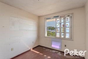 Casa em Condomínio à venda com 201m², 3 dormitórios, 1 suíte, 2 vagas, no bairro Tristeza em PORTO ALEGRE