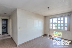 Casa em Condomínio à venda com 201m², 3 dormitórios, 1 suíte, 2 vagas, no bairro Tristeza em PORTO ALEGRE