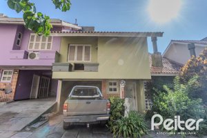 Casa em Condomínio à venda com 201m², 3 dormitórios, 1 suíte, 2 vagas, no bairro Tristeza em PORTO ALEGRE