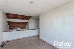 Casa em Condomínio à venda com 201m², 3 dormitórios, 1 suíte, 2 vagas, no bairro Tristeza em PORTO ALEGRE