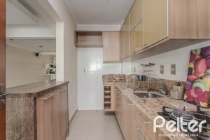 Casa à venda com 158m², 3 dormitórios, 1 suíte, 2 vagas, no bairro Tristeza em Porto Alegre