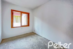 Casa em Condomínio à venda com 97m², 3 dormitórios, 1 suíte, 2 vagas, no bairro Espírito Santo em Porto Alegre