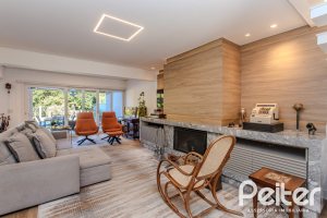 Casa em Condomínio à venda com 216m², 3 dormitórios, 1 suíte, 6 vagas, no bairro Terra Ville em PORTO ALEGRE