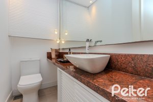 Casa em Condomínio à venda com 216m², 3 dormitórios, 1 suíte, 6 vagas, no bairro Terra Ville em PORTO ALEGRE