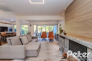 Casa em Condomínio à venda com 216m², 3 dormitórios, 1 suíte, 6 vagas, no bairro Terra Ville em PORTO ALEGRE