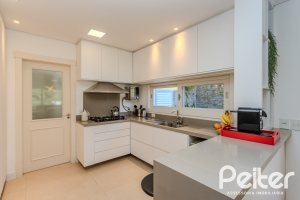 Casa em Condomínio à venda com 216m², 3 dormitórios, 1 suíte, 6 vagas, no bairro Terra Ville em PORTO ALEGRE