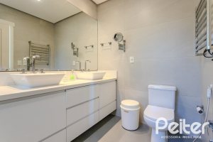 Casa em Condomínio à venda com 216m², 3 dormitórios, 1 suíte, 6 vagas, no bairro Terra Ville em PORTO ALEGRE