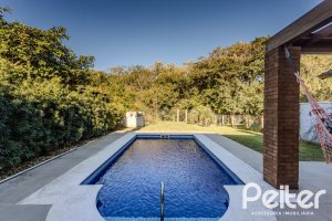 Casa em Condomínio à venda com 216m², 3 dormitórios, 1 suíte, 6 vagas, no bairro Terra Ville em PORTO ALEGRE