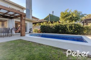 Casa em Condomínio à venda com 216m², 3 dormitórios, 1 suíte, 6 vagas, no bairro Terra Ville em PORTO ALEGRE