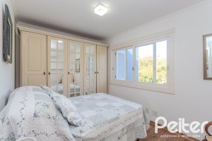 Casa em Condomínio à venda com 216m², 3 dormitórios, 1 suíte, 6 vagas, no bairro Terra Ville em PORTO ALEGRE