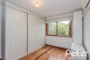 Apartamento à venda com 100m², 2 dormitórios, 1 suíte, 1 vaga, no bairro Tristeza em Porto Alegre