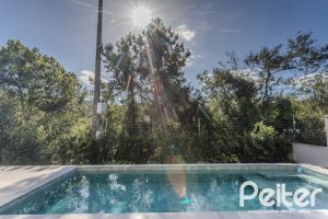 Casa em Condomínio à venda com 400m², 4 dormitórios, 4 suítes, 4 vagas, no bairro Alphaville em PORTO ALEGRE