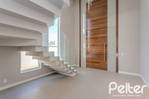 Casa em Condomínio à venda com 400m², 4 dormitórios, 4 suítes, 4 vagas, no bairro Alphaville em PORTO ALEGRE