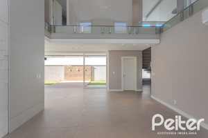 Casa em Condomínio à venda com 400m², 4 dormitórios, 4 suítes, 4 vagas, no bairro Alphaville em PORTO ALEGRE