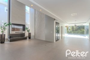 Casa em Condomínio à venda com 400m², 4 dormitórios, 4 suítes, 4 vagas, no bairro Alphaville em PORTO ALEGRE