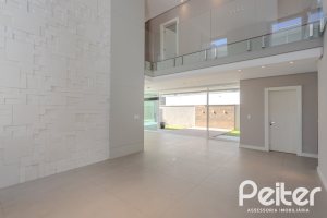 Casa em Condomínio à venda com 400m², 4 dormitórios, 4 suítes, 4 vagas, no bairro Alphaville em PORTO ALEGRE