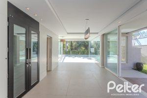 Casa em Condomínio à venda com 400m², 4 dormitórios, 4 suítes, 4 vagas, no bairro Alphaville em PORTO ALEGRE