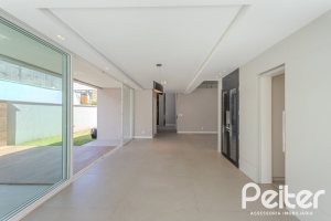 Casa em Condomínio à venda com 400m², 4 dormitórios, 4 suítes, 4 vagas, no bairro Alphaville em PORTO ALEGRE