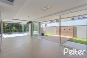 Casa em Condomínio à venda com 400m², 4 dormitórios, 4 suítes, 4 vagas, no bairro Alphaville em PORTO ALEGRE