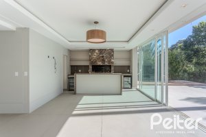 Casa em Condomínio à venda com 400m², 4 dormitórios, 4 suítes, 4 vagas, no bairro Alphaville em PORTO ALEGRE
