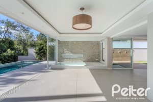 Casa em Condomínio à venda com 400m², 4 dormitórios, 4 suítes, 4 vagas, no bairro Alphaville em PORTO ALEGRE