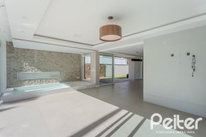 Casa em Condomínio à venda com 400m², 4 dormitórios, 4 suítes, 4 vagas, no bairro Alphaville em PORTO ALEGRE