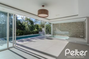 Casa em Condomínio à venda com 400m², 4 dormitórios, 4 suítes, 4 vagas, no bairro Alphaville em PORTO ALEGRE