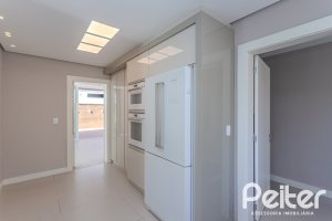 Casa em Condomínio à venda com 400m², 4 dormitórios, 4 suítes, 4 vagas, no bairro Alphaville em PORTO ALEGRE