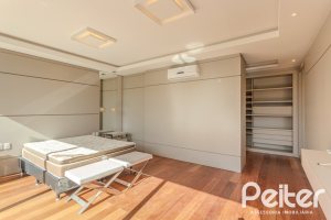 Casa em Condomínio à venda com 400m², 4 dormitórios, 4 suítes, 4 vagas, no bairro Alphaville em PORTO ALEGRE
