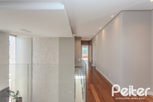 Casa em Condomínio à venda com 400m², 4 dormitórios, 4 suítes, 4 vagas, no bairro Alphaville em PORTO ALEGRE