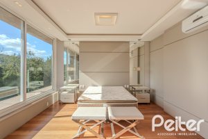 Casa em Condomínio à venda com 400m², 4 dormitórios, 4 suítes, 4 vagas, no bairro Alphaville em PORTO ALEGRE