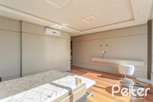 Casa em Condomínio à venda com 400m², 4 dormitórios, 4 suítes, 4 vagas, no bairro Alphaville em PORTO ALEGRE