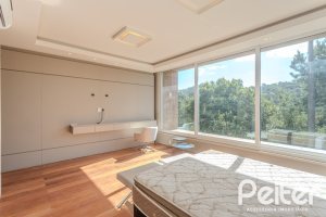Casa em Condomínio à venda com 400m², 4 dormitórios, 4 suítes, 4 vagas, no bairro Alphaville em PORTO ALEGRE