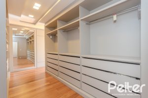 Casa em Condomínio à venda com 400m², 4 dormitórios, 4 suítes, 4 vagas, no bairro Alphaville em PORTO ALEGRE