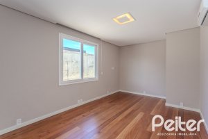 Casa em Condomínio à venda com 400m², 4 dormitórios, 4 suítes, 4 vagas, no bairro Alphaville em PORTO ALEGRE